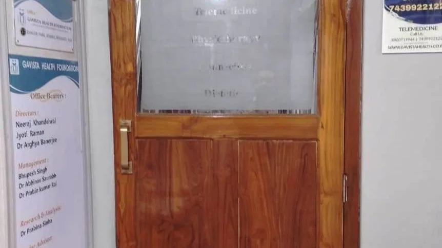 Doctor consulting with patient